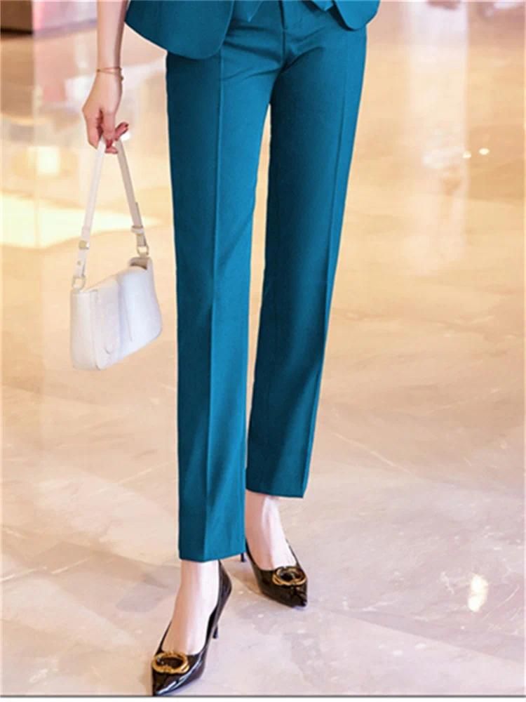 Pantalon bleu paon