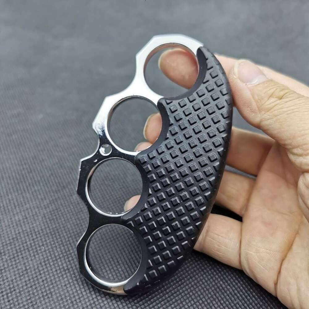 Black handled silver four finger buckle