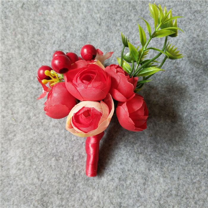 Czerwony boutonniere