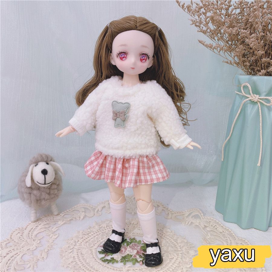 Yaxu-doll en kleding
