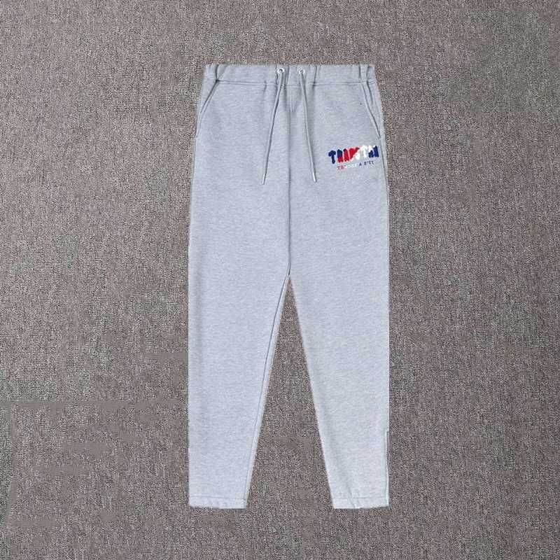 pantalones sencillos con logo gris azul rojo