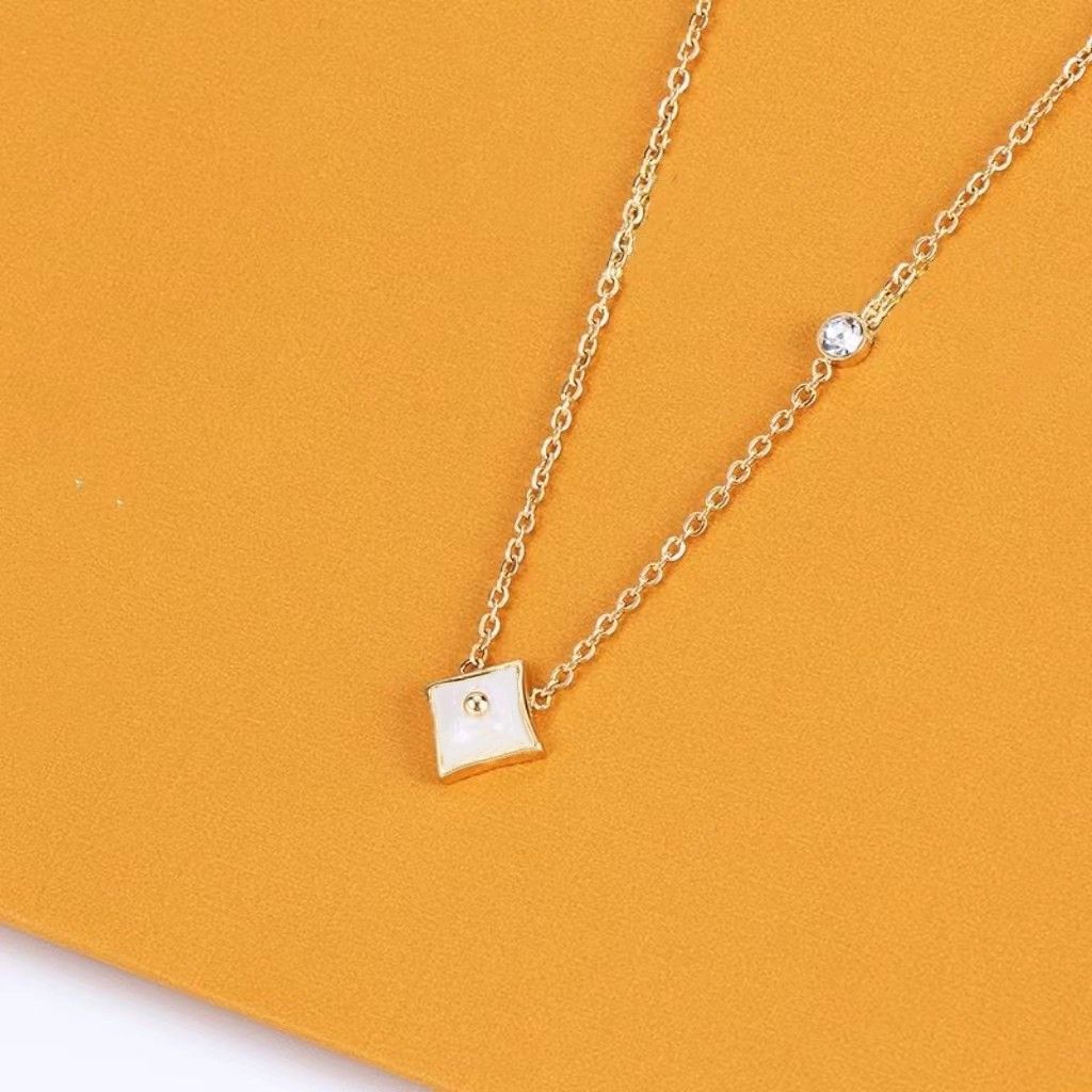 Gold square flower necklace