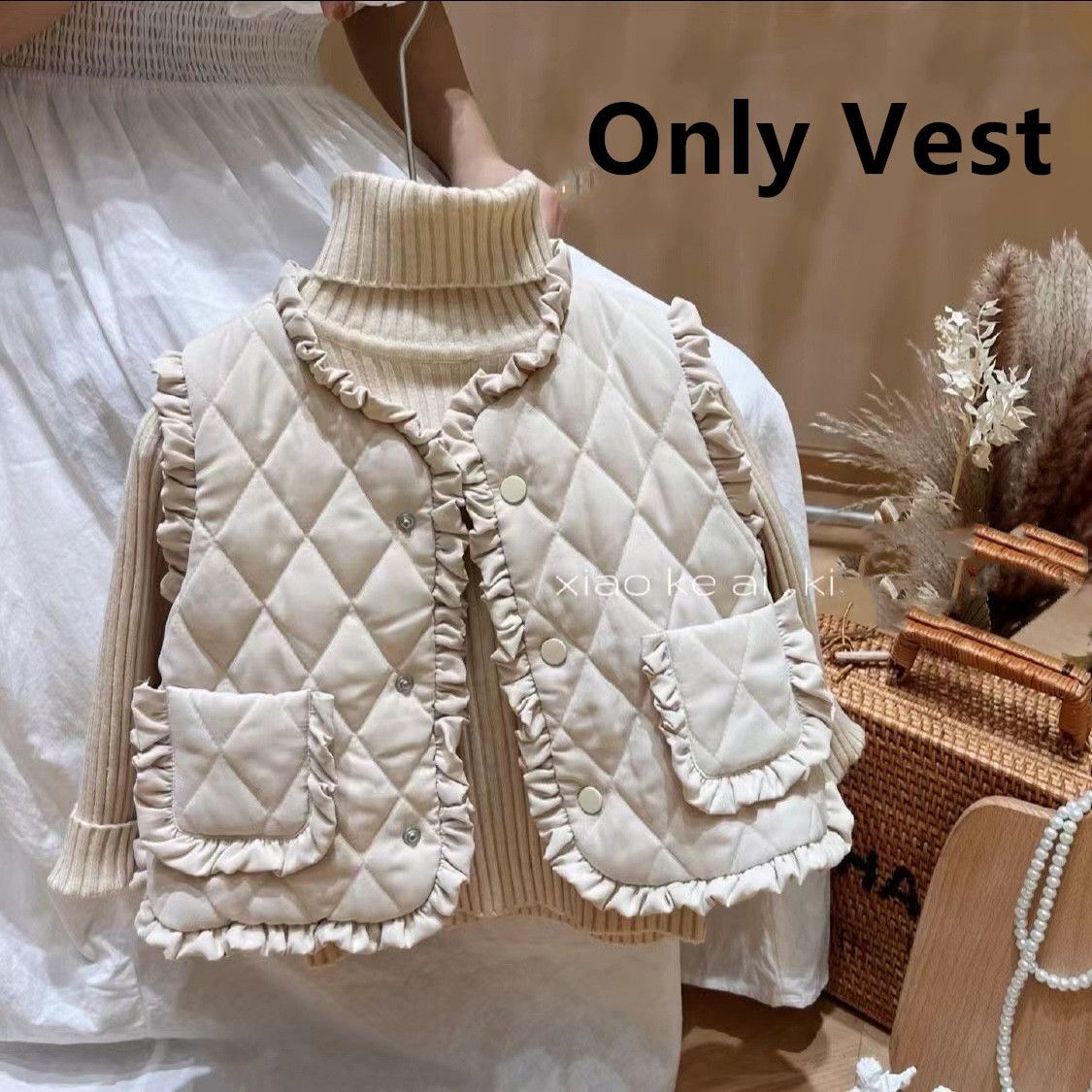 beige vest only