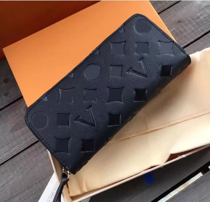 embossed black wallet with box