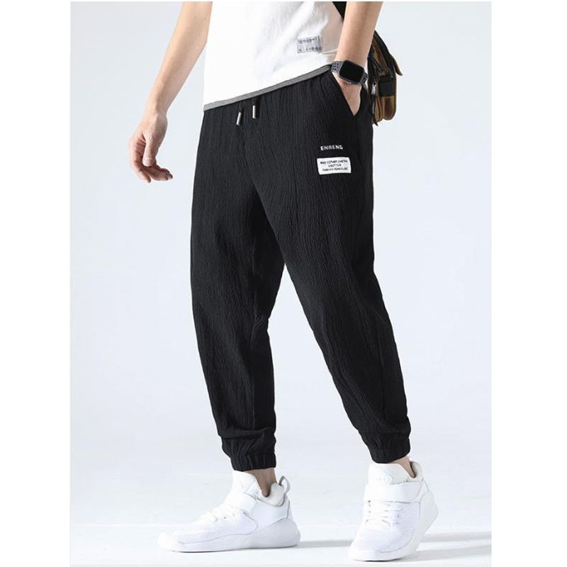 Men pantalones negros