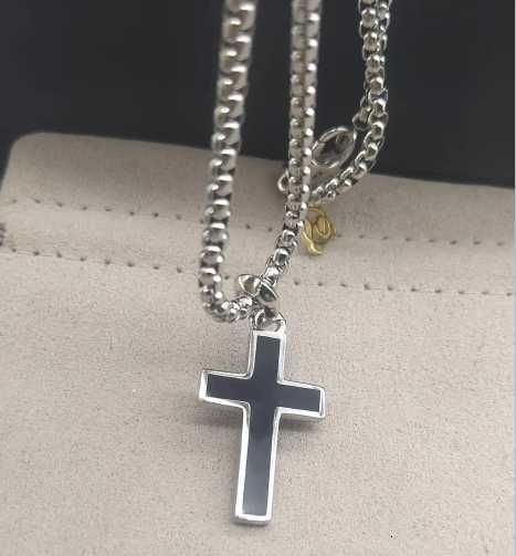 cross black with logo