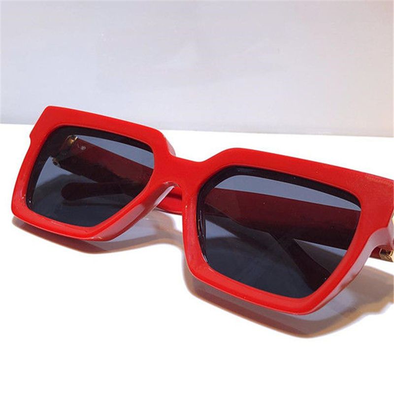 Red frame grey lens