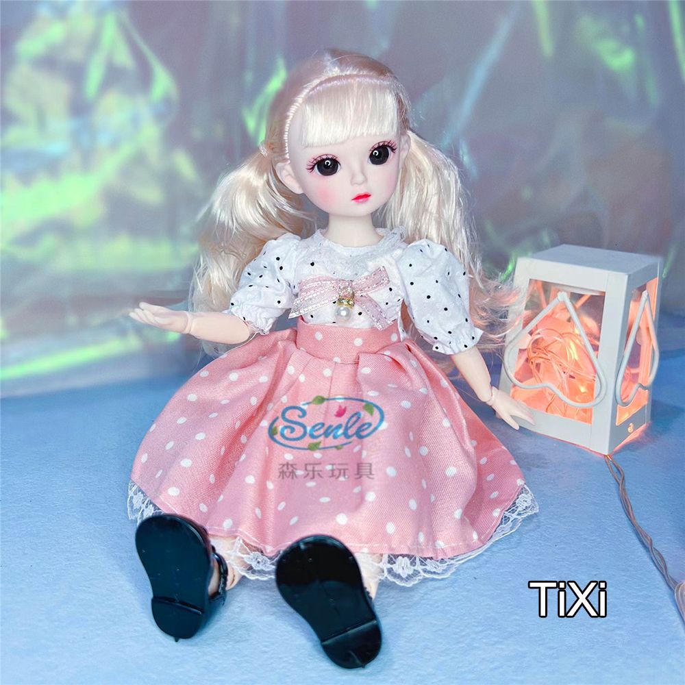 Tixi-Dolls And Clothes