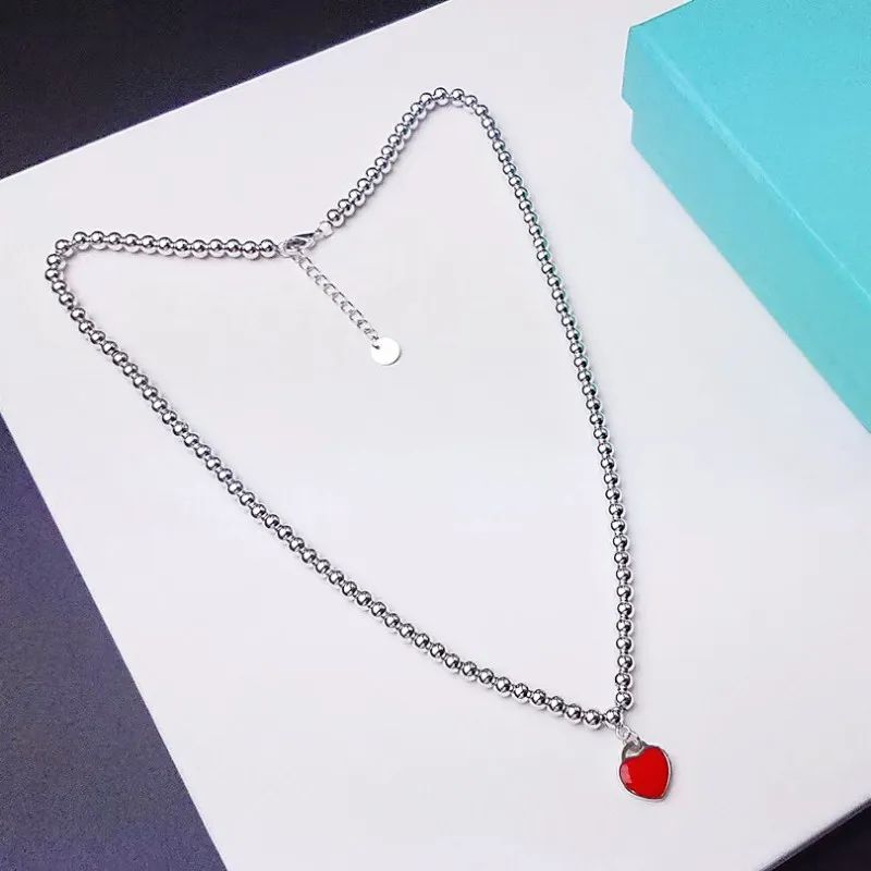 Argent + rouge (collier)