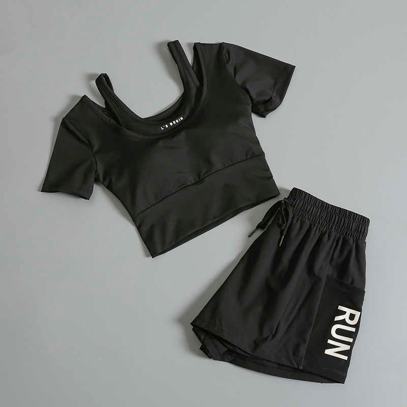 black short sleeves + black shorts