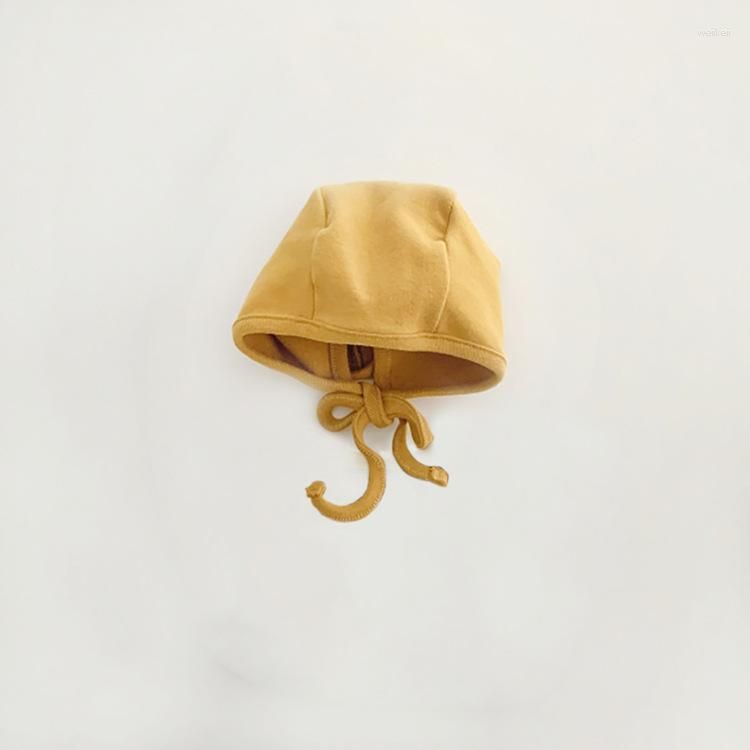 gele hoed