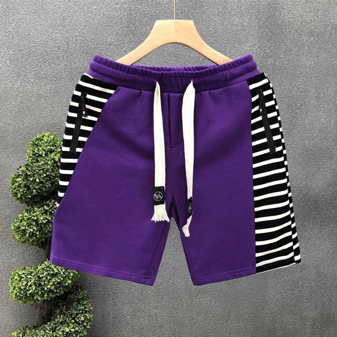 purple striped shorts