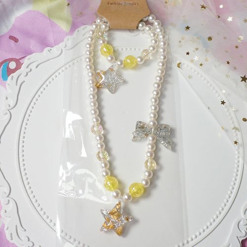 Collier étoile jaune