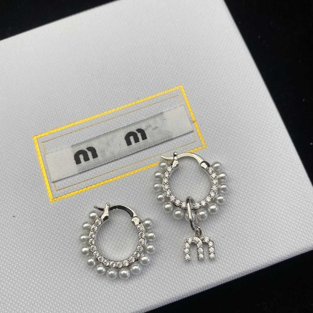 Miao Family Silver Earrings (letter Pa