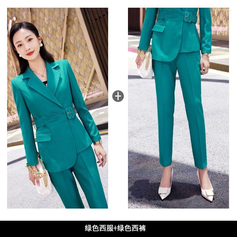 green pantsuits