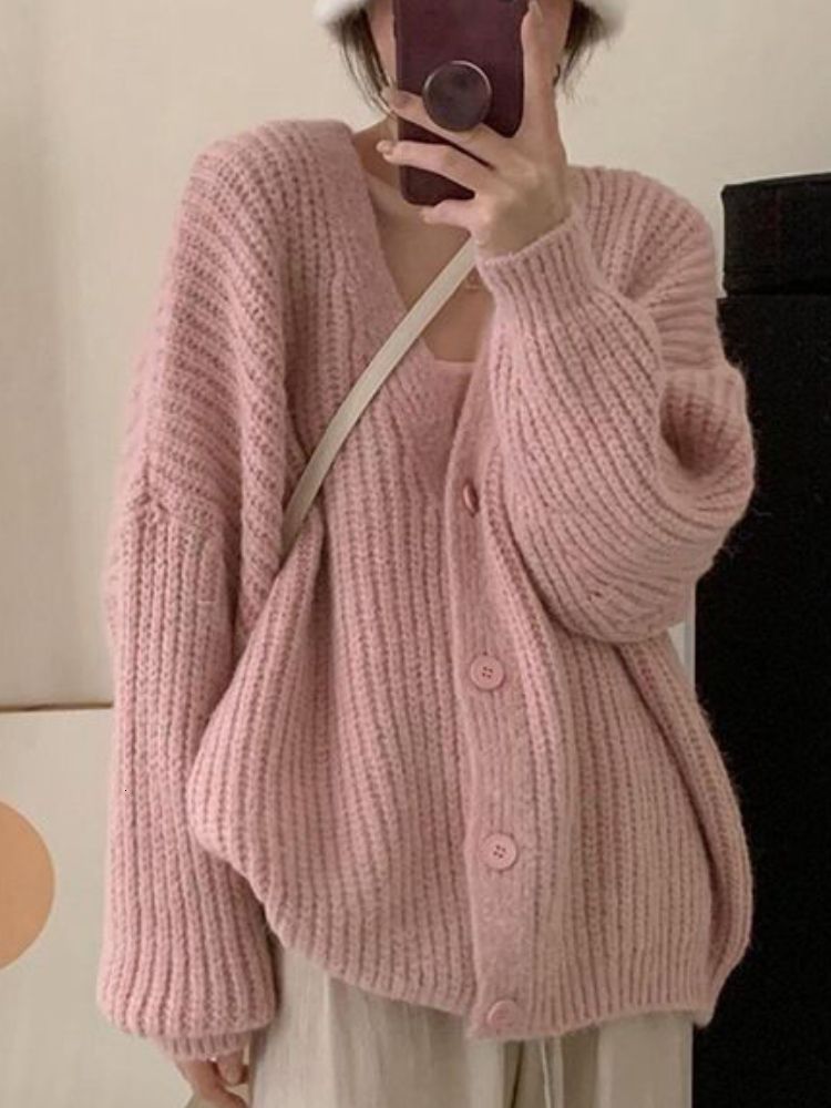 Różowy swetra