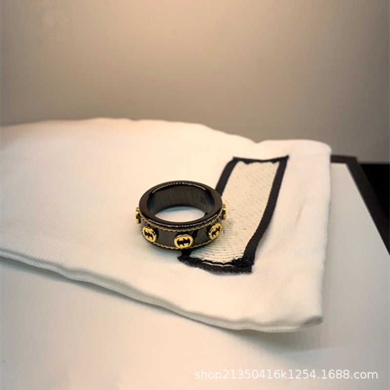 Double g Ring with Chip, Gold, Black,