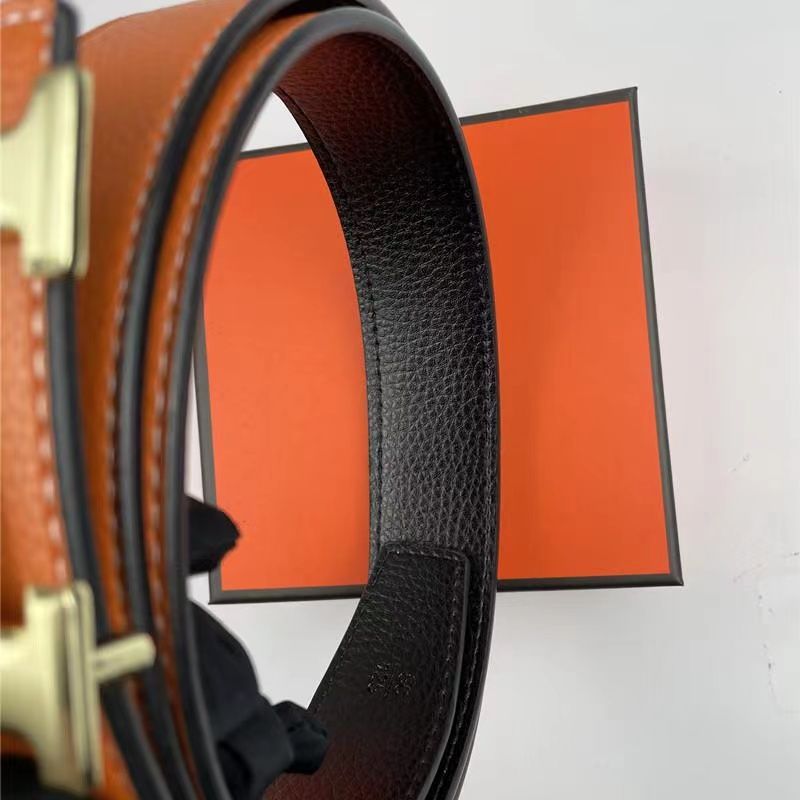 Orange belts with gold buckle