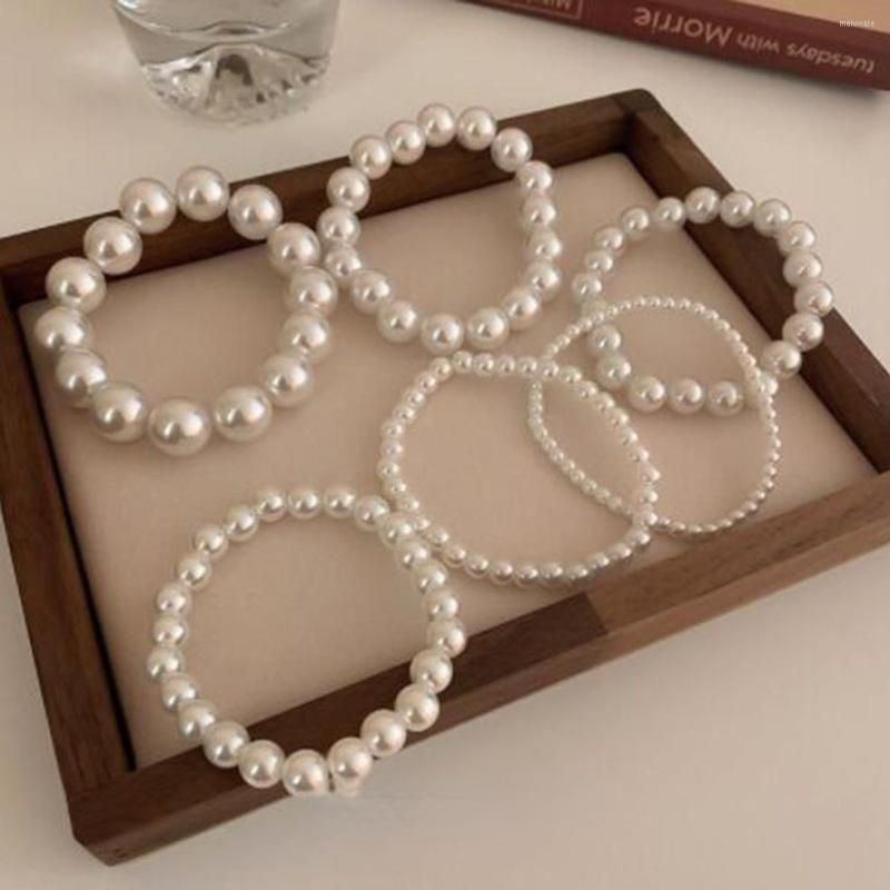 Advanced Beaded Glass Shell Synthetic Pearl Bracelets For Women White Round  Strand In 4 14mm Sizes With Elastic Hand Jewelry Making Design From  Melvinate, $7.43