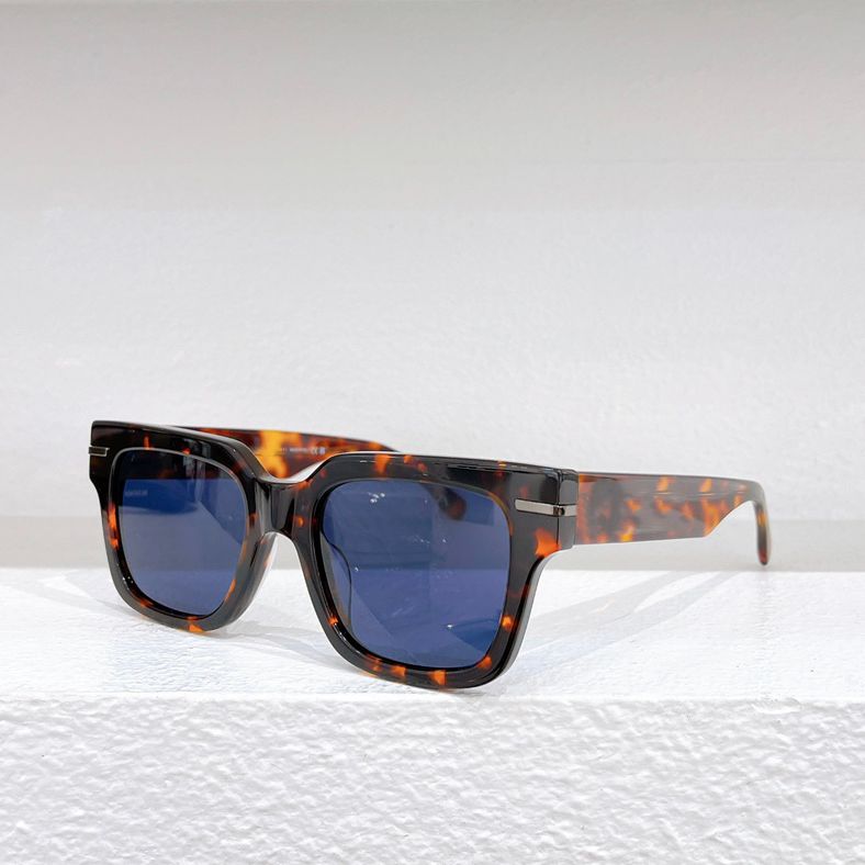 Amber Frame Blue Lens