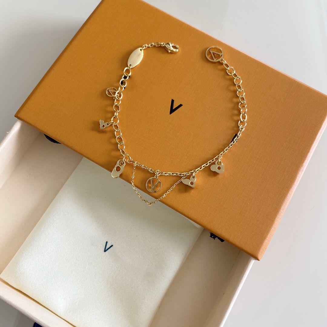 Las mejores ofertas en Oro Amarillo Louis Vuitton encantos Pulseras