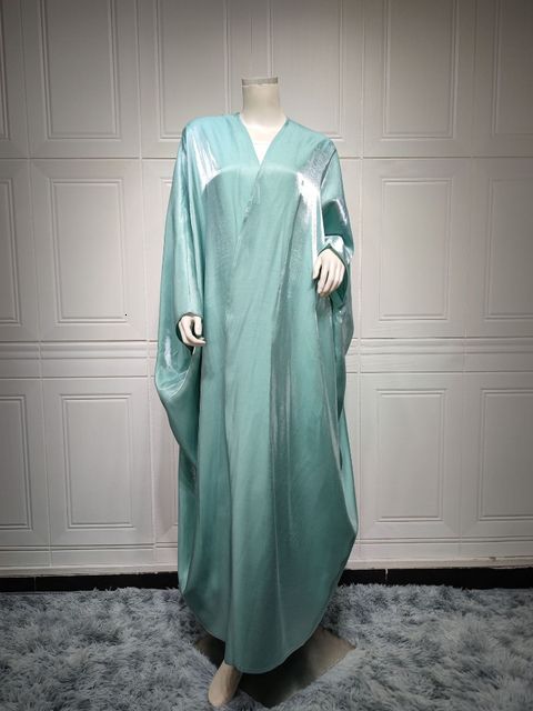 Ljusgrön abaya-en
