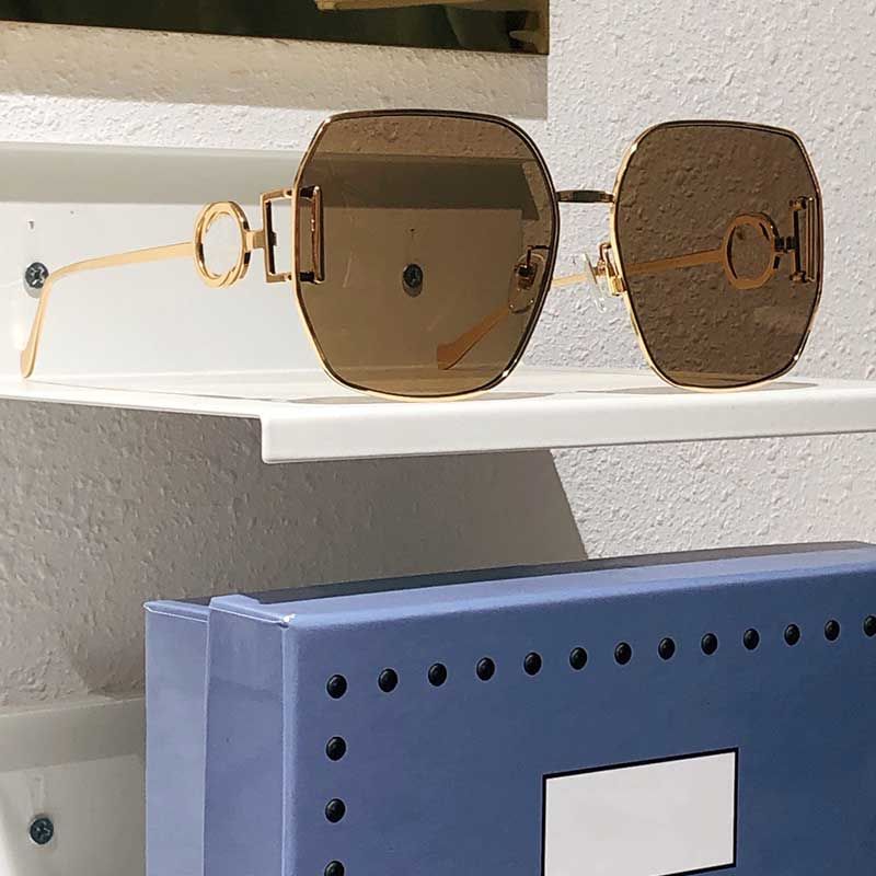 Lentes marrones con montura de metal