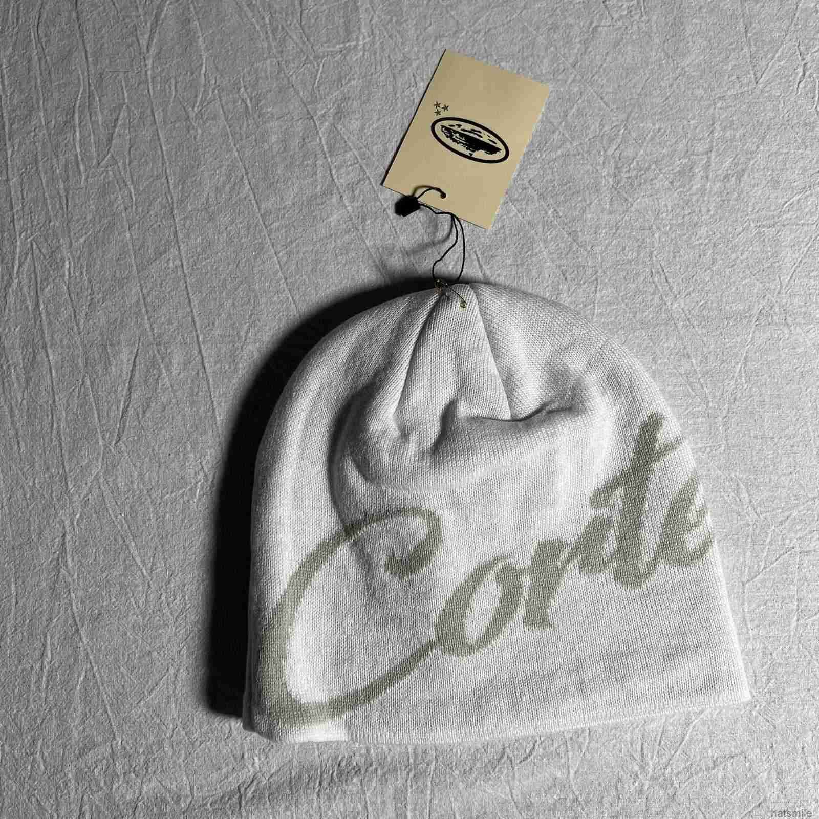 white gray co font cold hat