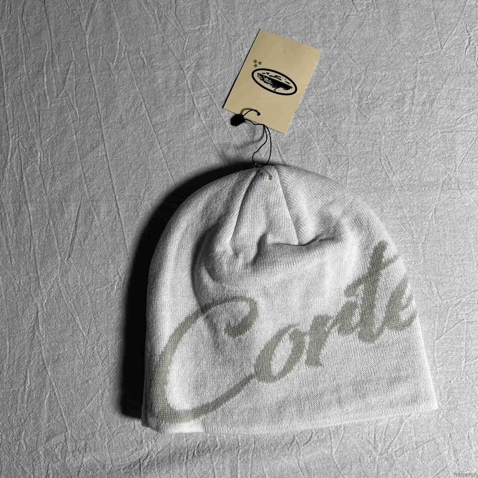 White gray co font cold hat