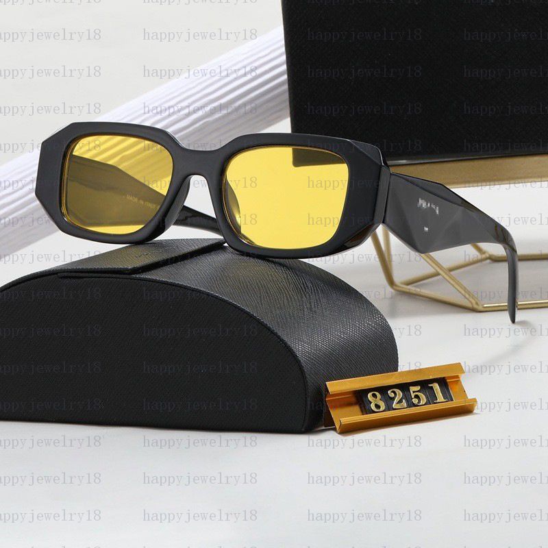 Black framed yellow lenses