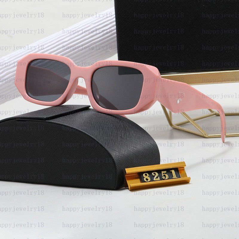 pink framed black grey lenses