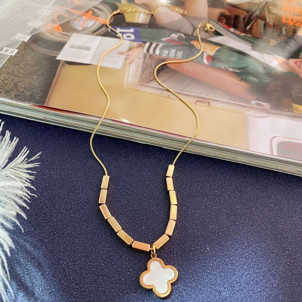 Golden Four Leaf Flower Necklace