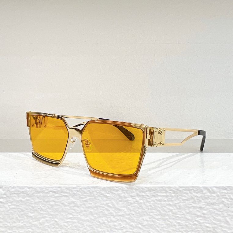 gold frame yellow lens