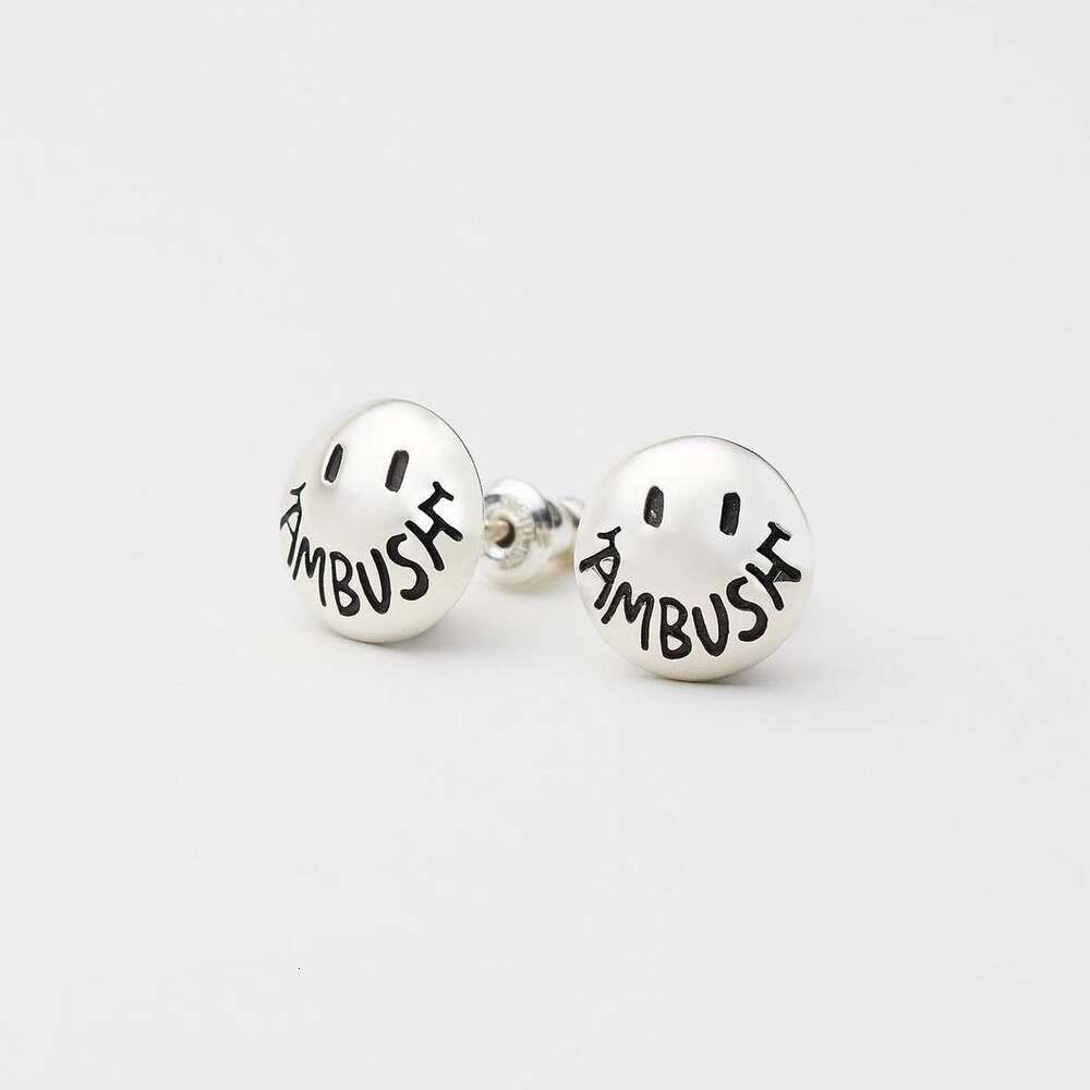 Boucles d'oreilles en argent souriant