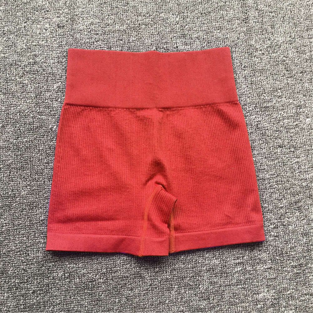 red shorts