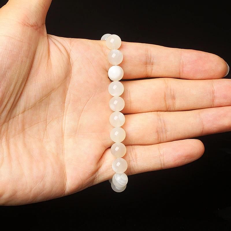 Perles de 6 mm, 17 cm, pierre de lune blanche.