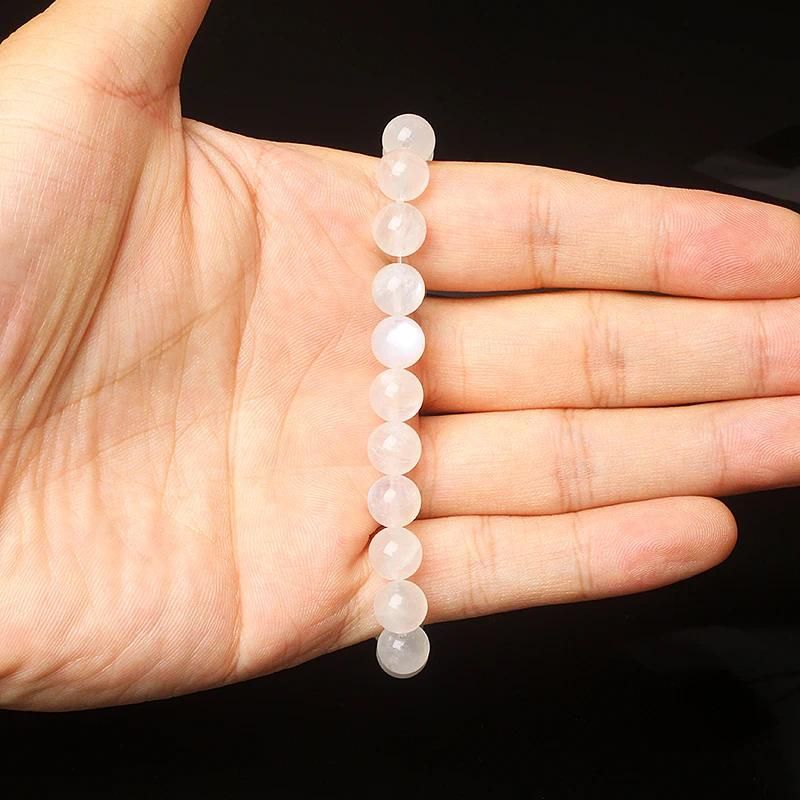 Perles de 6 mm, 17 cm, pierre de lune bleue.