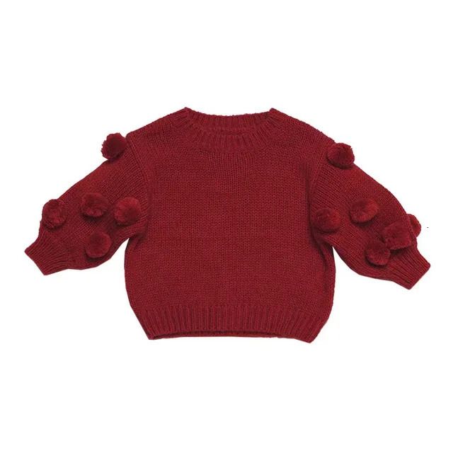 暗赤色のセーター