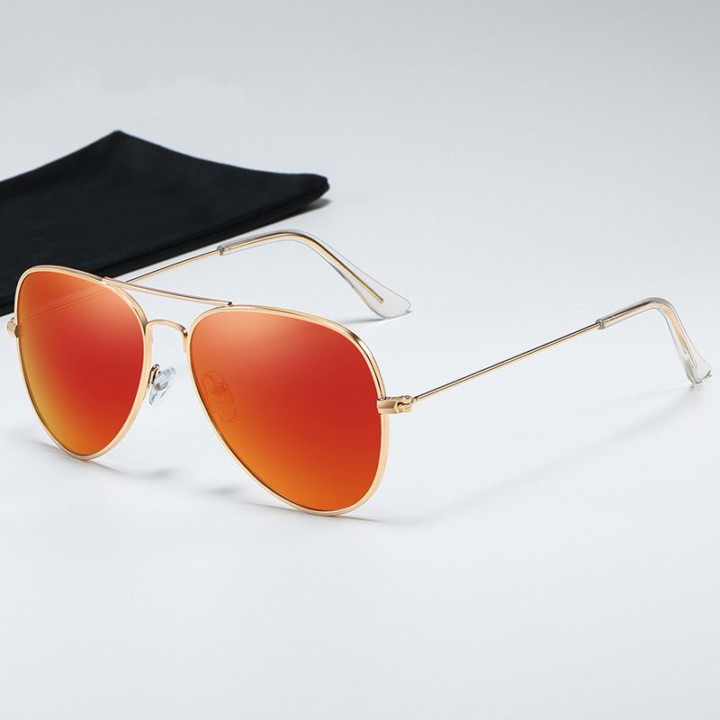 Gold framed orange red lenses