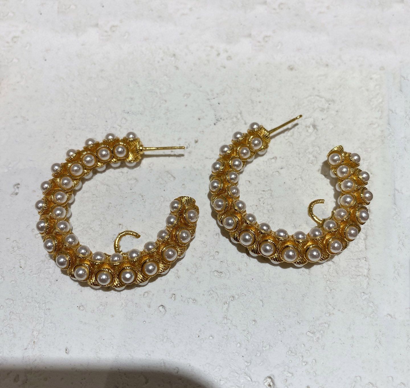 001 boucle d'oreille + boîte