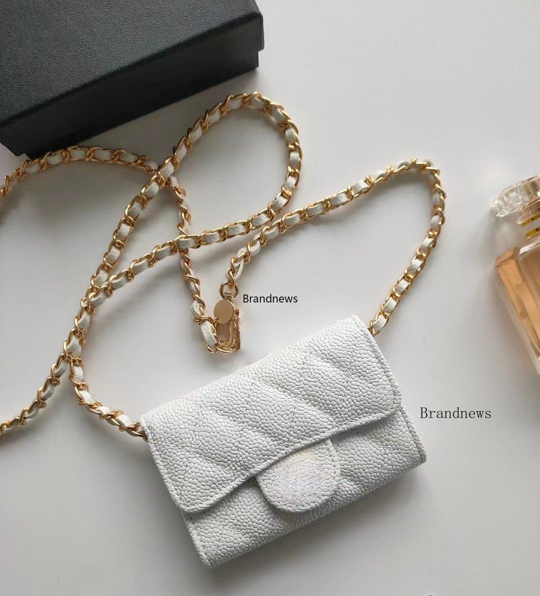 White cowhide+gold hardware