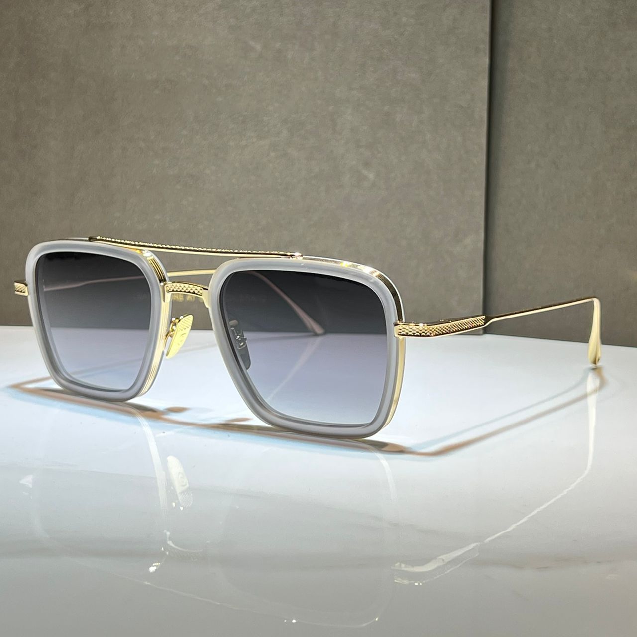 grey gold-gradient grey lens