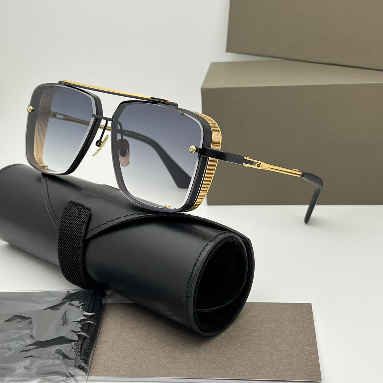 Black Gold Frame Gradient Grey Lens