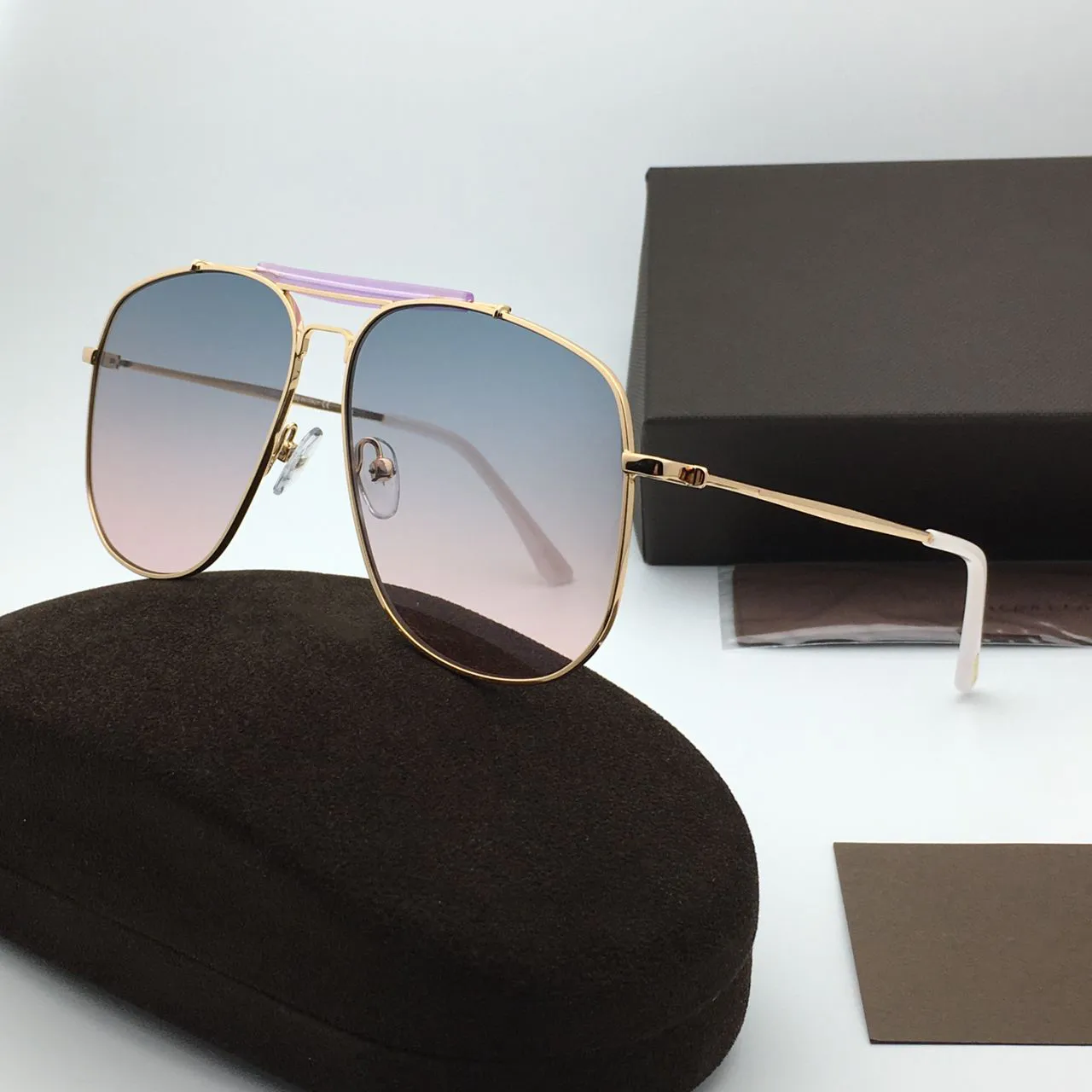 gold frame blue gradient pink lens