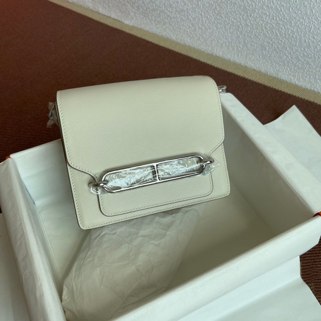White & silver buckle