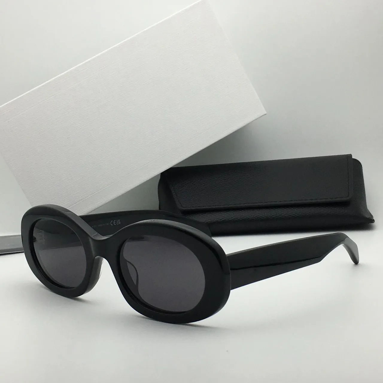 black gold frame grey lens