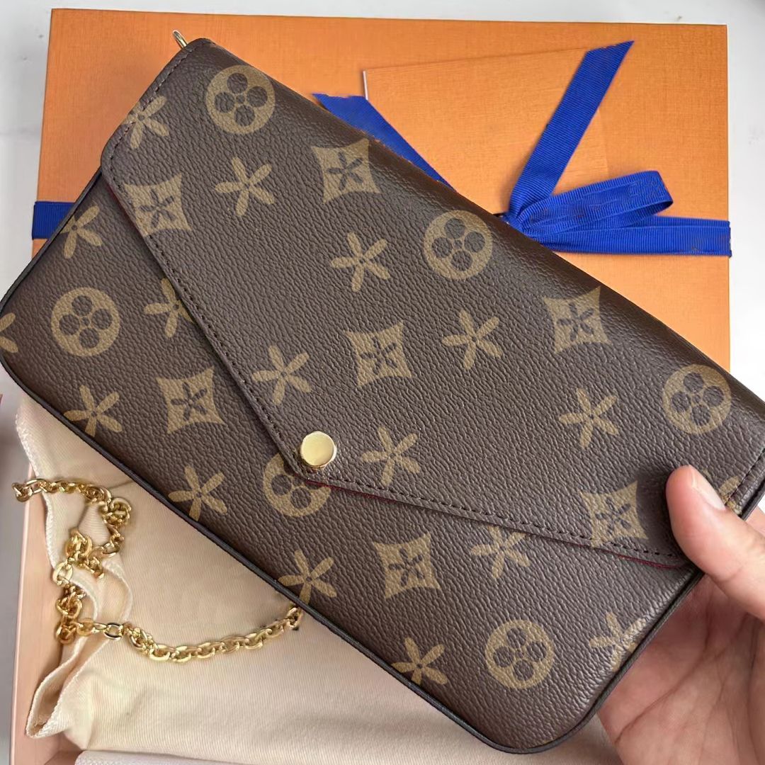 Buona tracolla a catena pochette di Louis Vuitton in Marrone