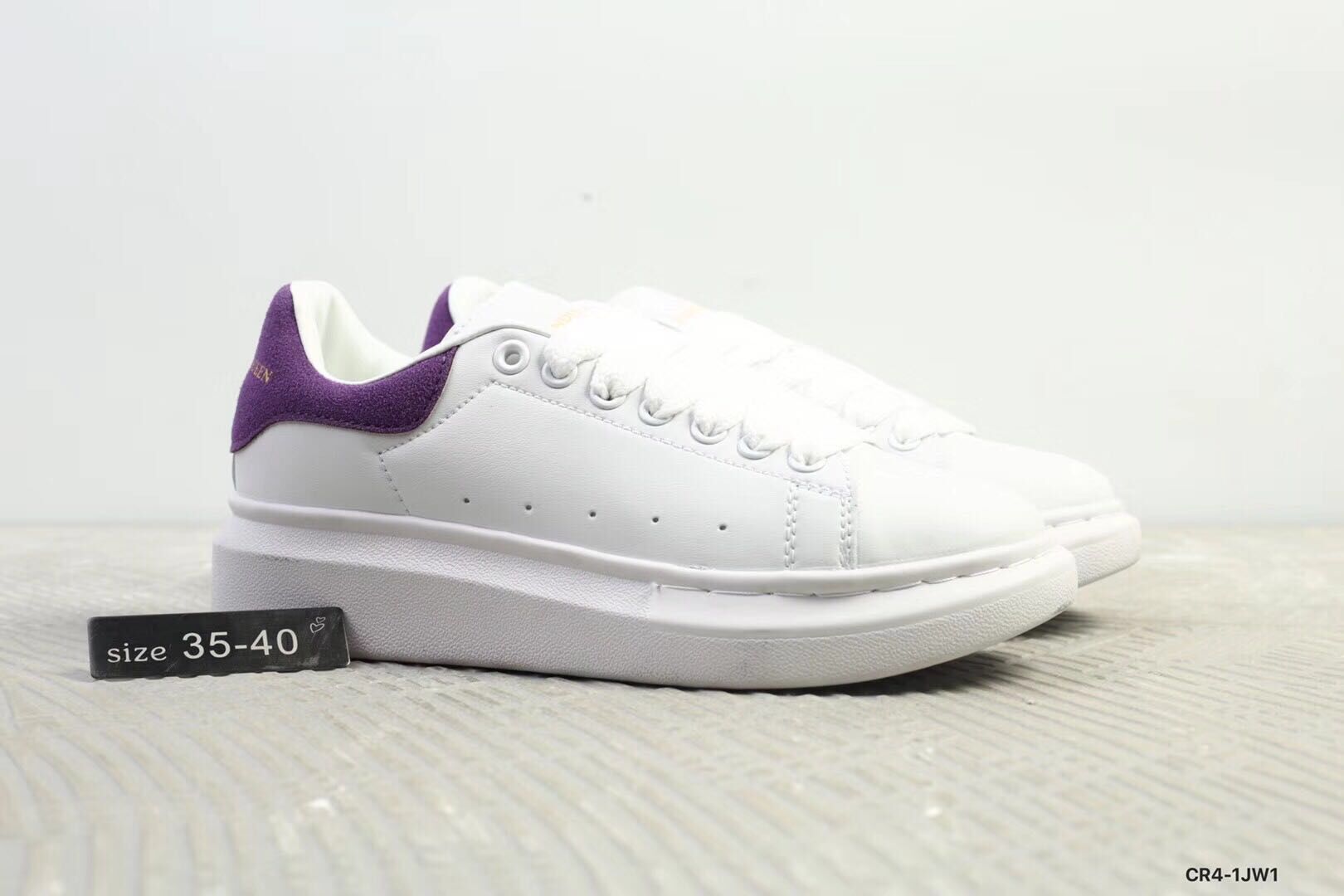 OVERSIZED SNEAKERS IN WHITE CALFSKIN WITH THISTLE PURPLE SUEDE HEEL TAB