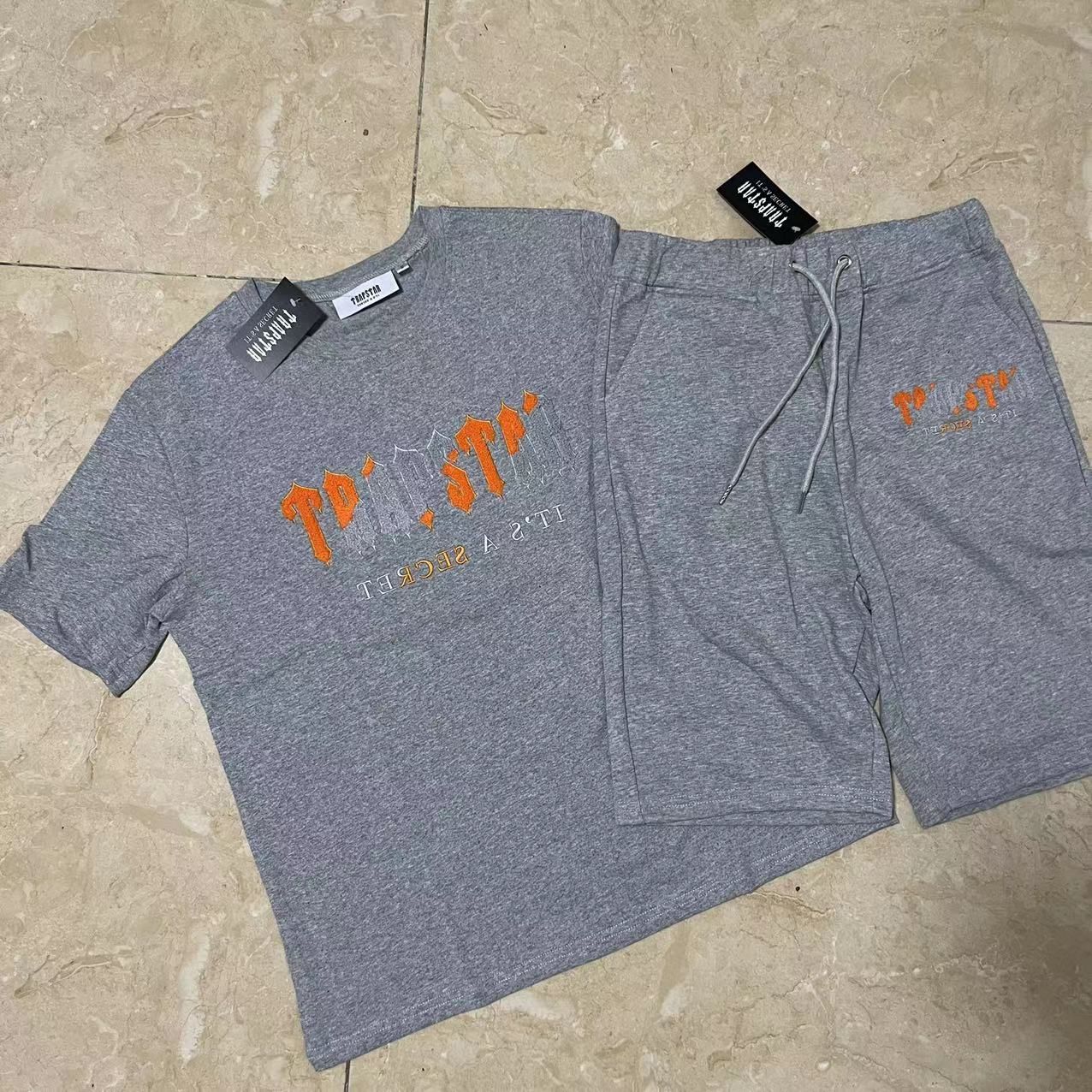 gray orange letter