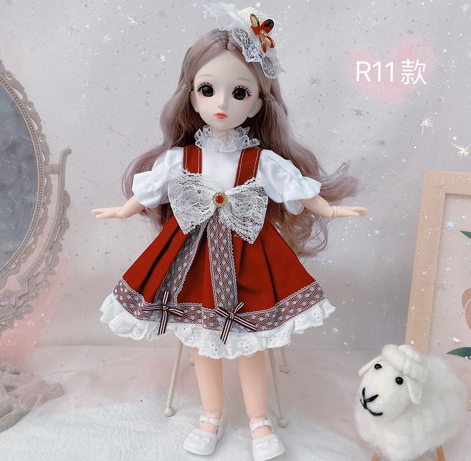 R11-Puppe und Kleidung